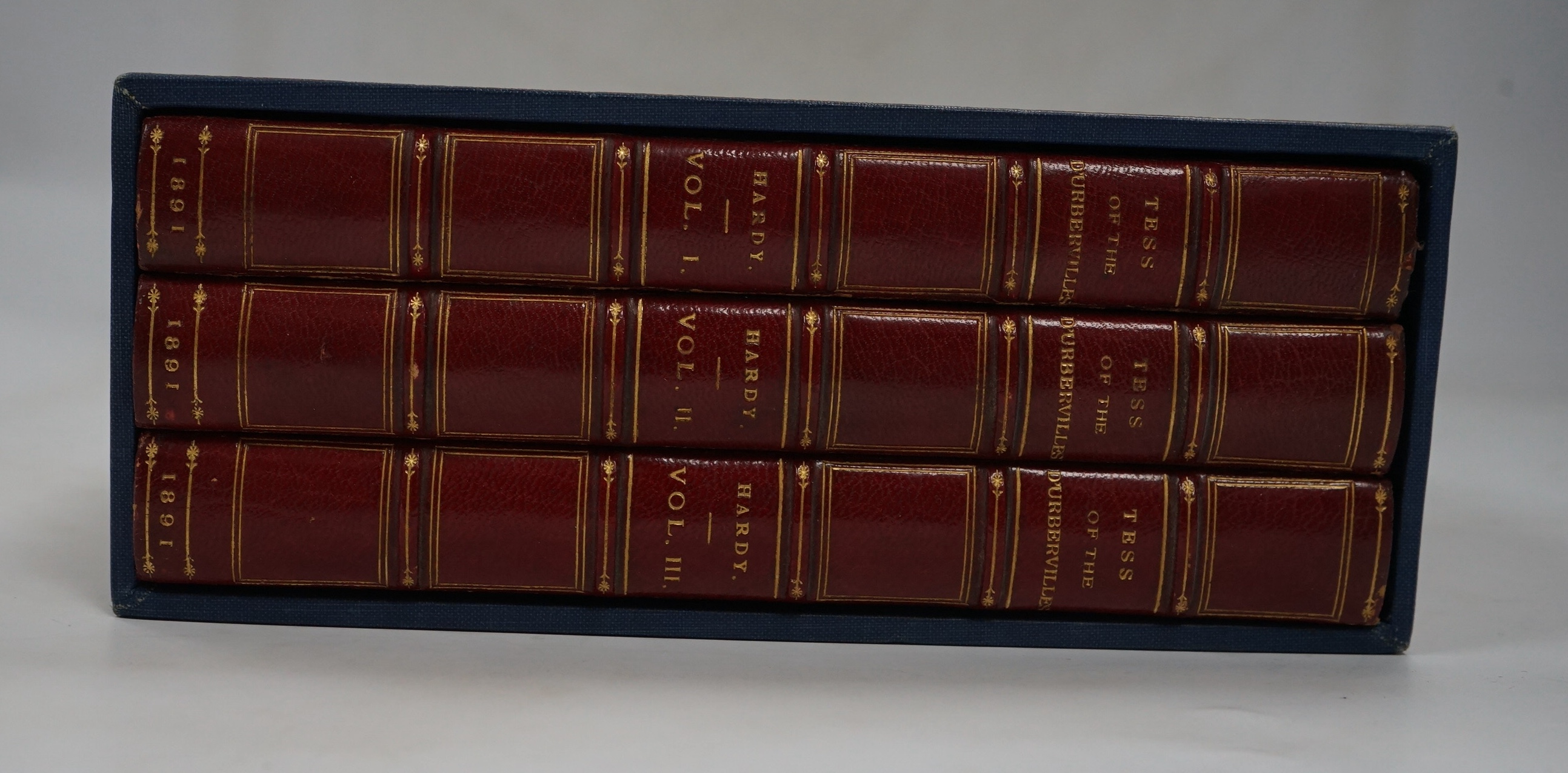 Hardy, Thomas - Tess of the D'Urbervilles a pure woman faithfully presented...in three volumes, London: James R. Osgood, McIlvaine and Co., 1891, 8vo, with half titles, contemporary red crushed half morocco, green silk b